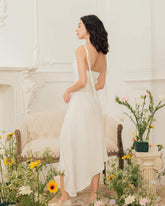 Silk cowl neck midi dress with asymmetric hem and adjustable tie shoulder straps